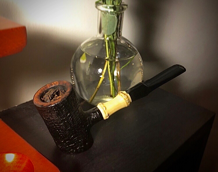 J Mouton smoking pipe