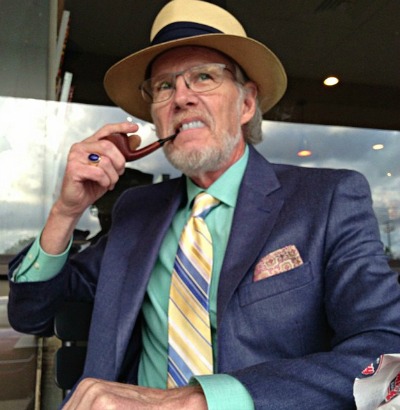 Steve Morrisette with tobacco pipe outside
